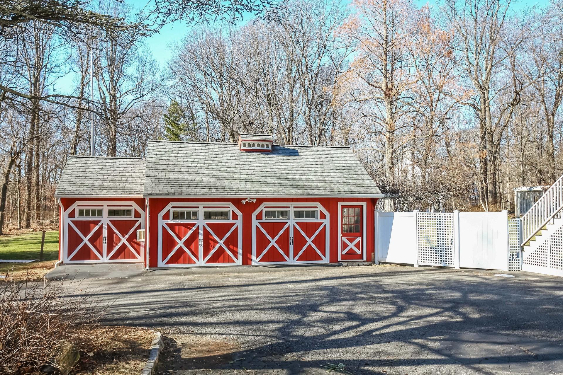 228 Ponus Ridge Road New Canaan, CT 06840 - Photo 32 of 47 a sign that is on the side of a building