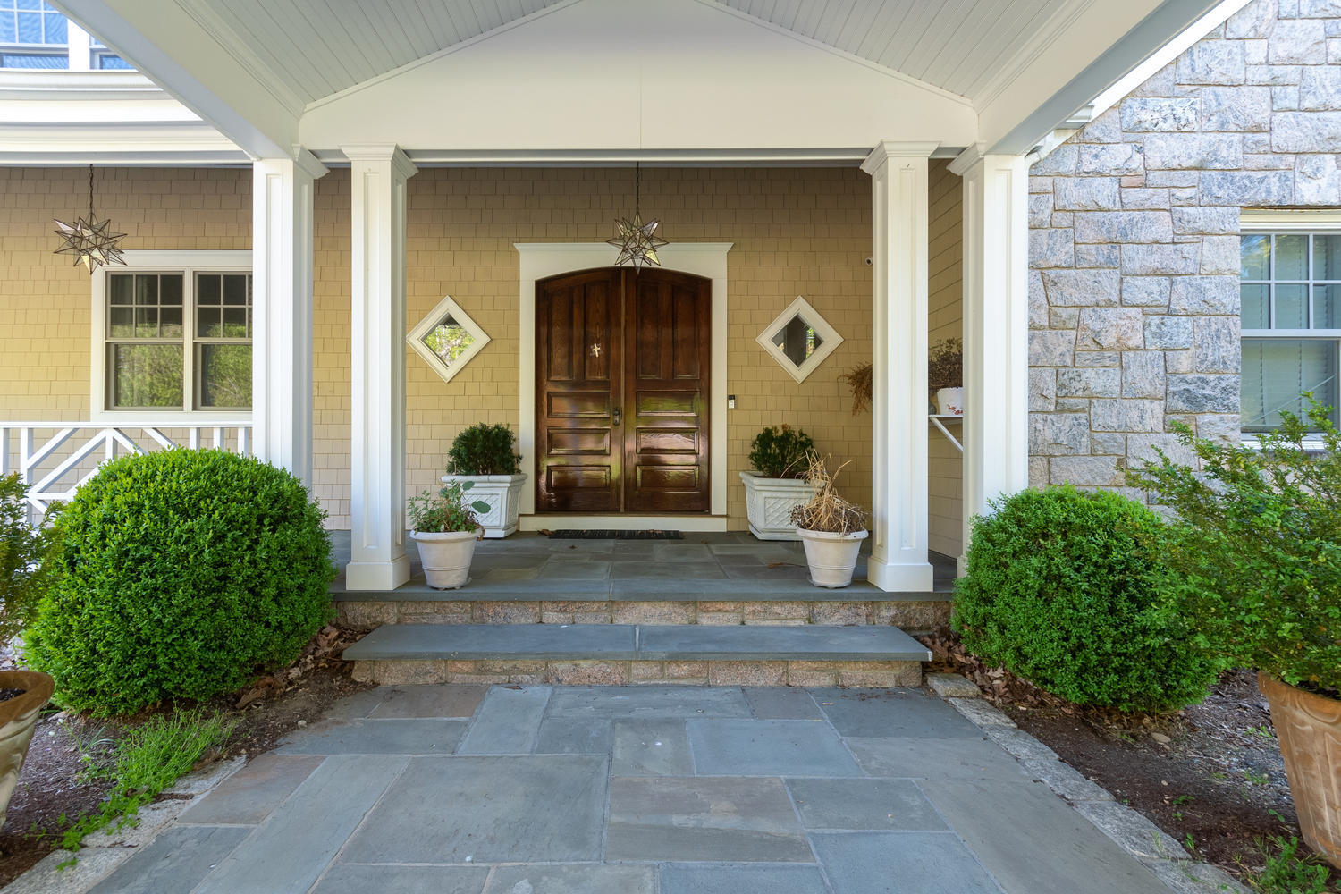 228 Ponus Ridge Road New Canaan, CT 06840 - Photo 5 of 47 a view of a house with porch