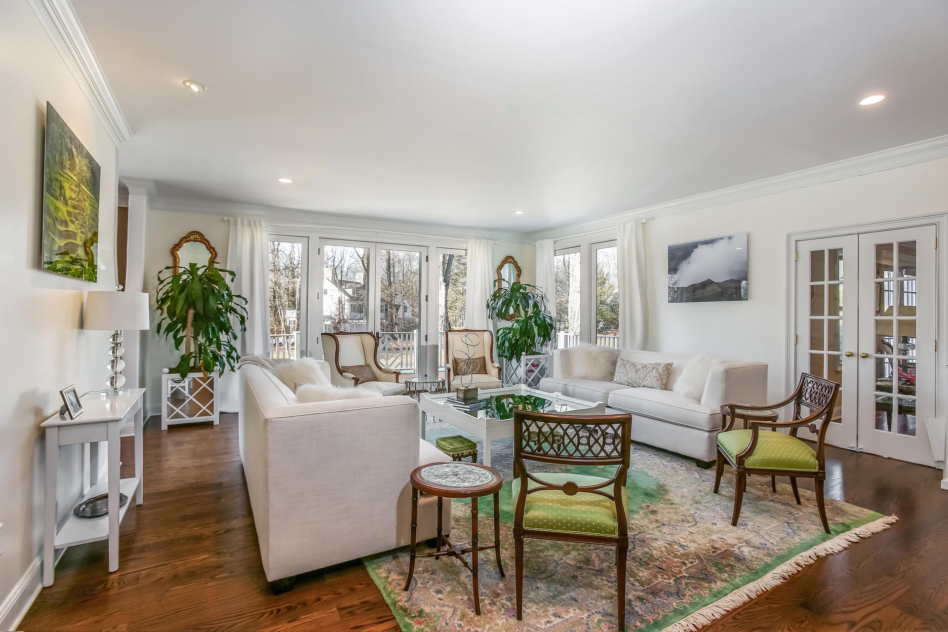 228 Ponus Ridge Road New Canaan, CT 06840 - Photo 8 of 47 a living room with furniture and a large window