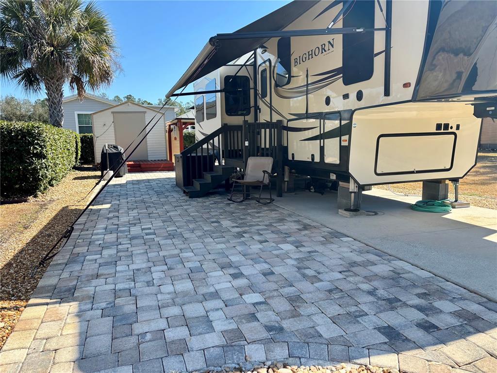a view of a street with seating space