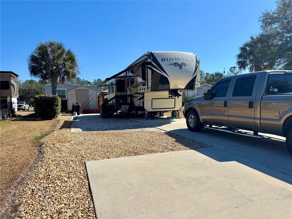 3047 Northeast 102nd Ave Road Silver Springs, FL 34488 - Photo 2 of 87 a car parked in front of house