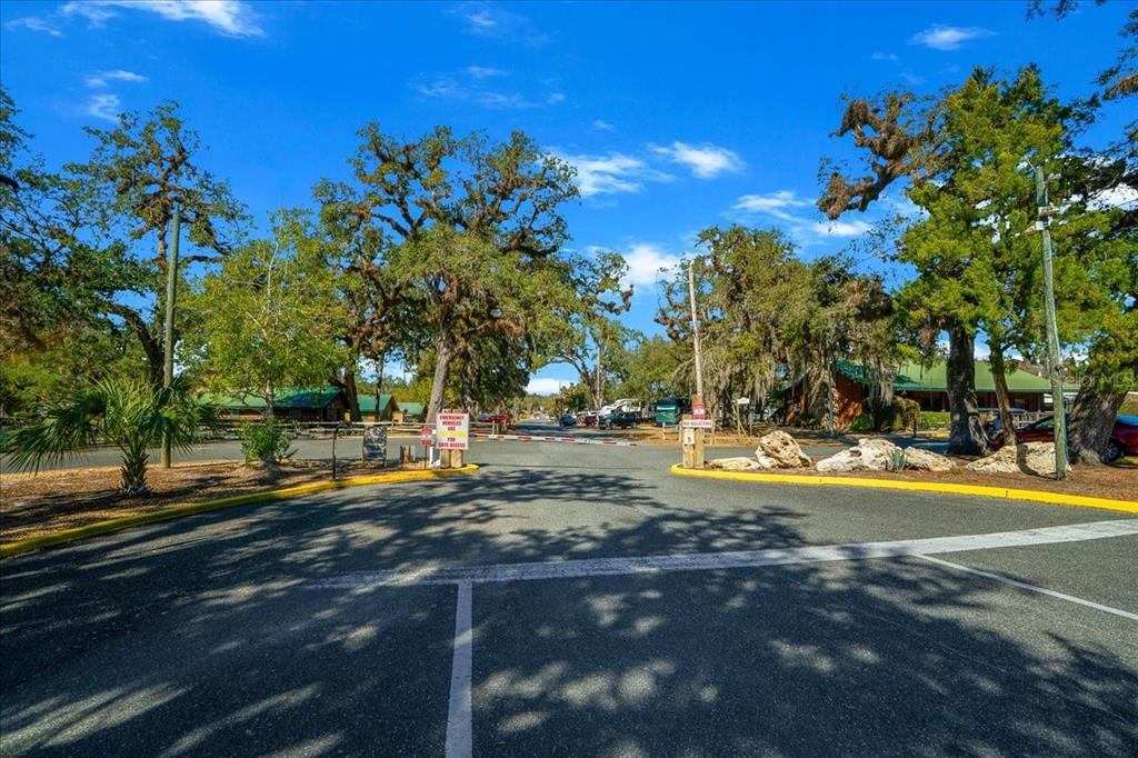 3047 Northeast 102nd Ave Road Silver Springs, FL 34488 - Photo 21 of 87 a view of a swimming pool with an outdoor space and seating area