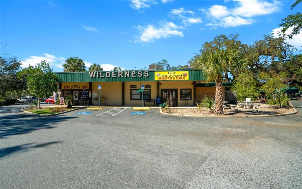 3047 Northeast 102nd Ave Road Silver Springs, FL 34488 - Photo 23 of 87 a view of a car park in front of the building