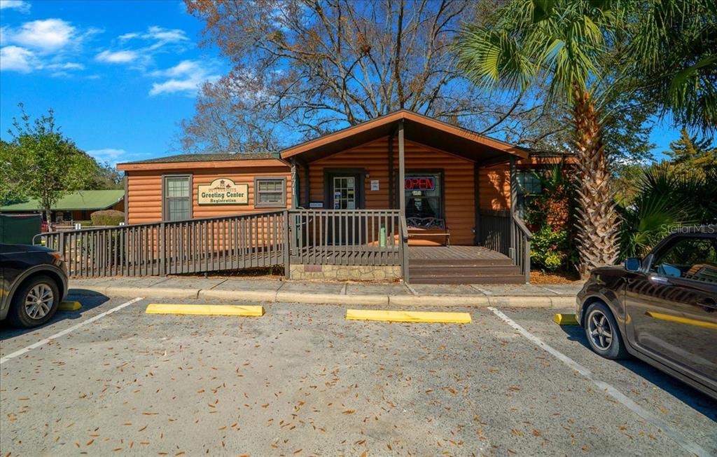 3047 Northeast 102nd Ave Road Silver Springs, FL 34488 - Photo 24 of 87 a view of a house with swimming pool and sitting area