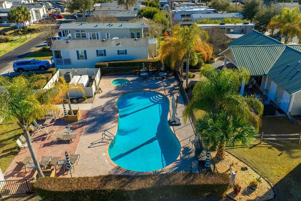 3047 Northeast 102nd Ave Road Silver Springs, FL 34488 - Photo 85 of 87 an aerial view of a house with garden space and street view