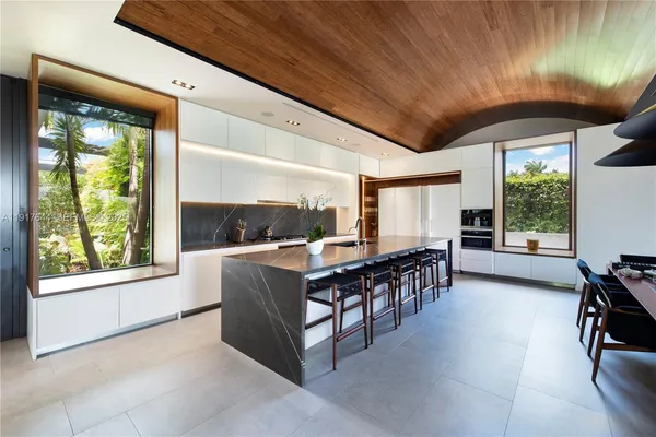 a open kitchen with stainless steel appliances granite countertop lots of counter top space