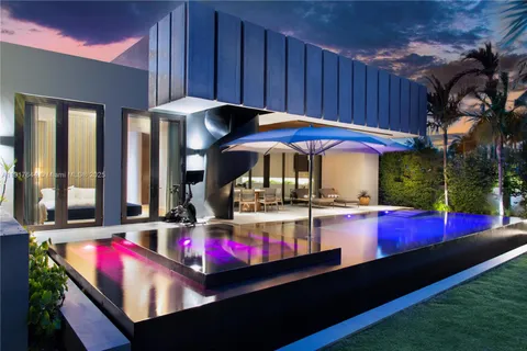 a view of swimming pool with a patio