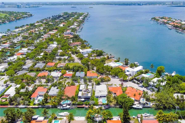 a view of swimming pool with sitting area