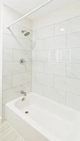 a bathroom with a bathtub
