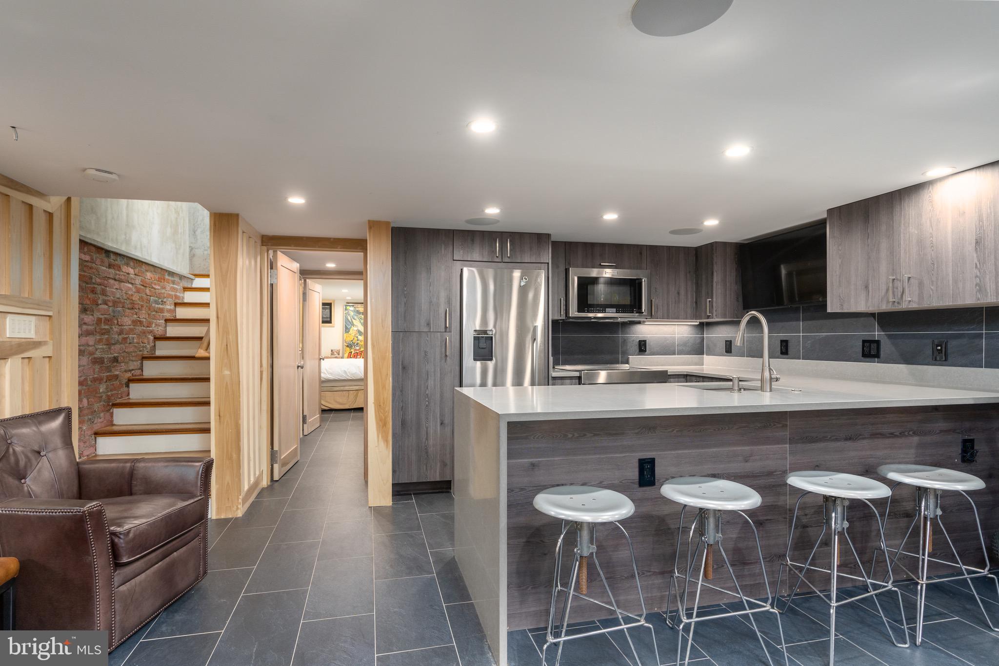 3003 N Street Northwest Washington, DC 20007 - Photo 111 of 127 Lower level rec/living/dining room