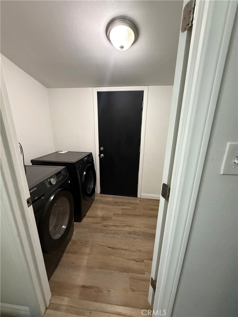 455 East Wilson Street Rialto, CA 92376 - Photo 5 of 8 Laundry room with washer and dryer hook up.