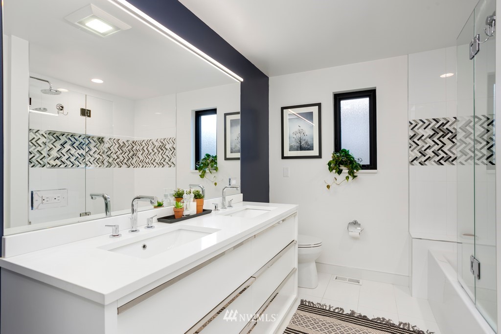 952 Daley Street Edmonds, WA 98020 - Photo 14 of 29 a bathroom with a sink a toilet and shower
