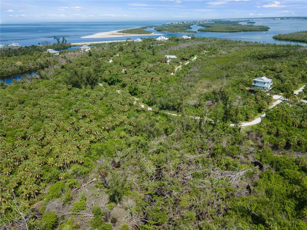 Pointe Way Boca Grande, FL 33921 - Photo 7 of 13 a view of a field with an ocean view