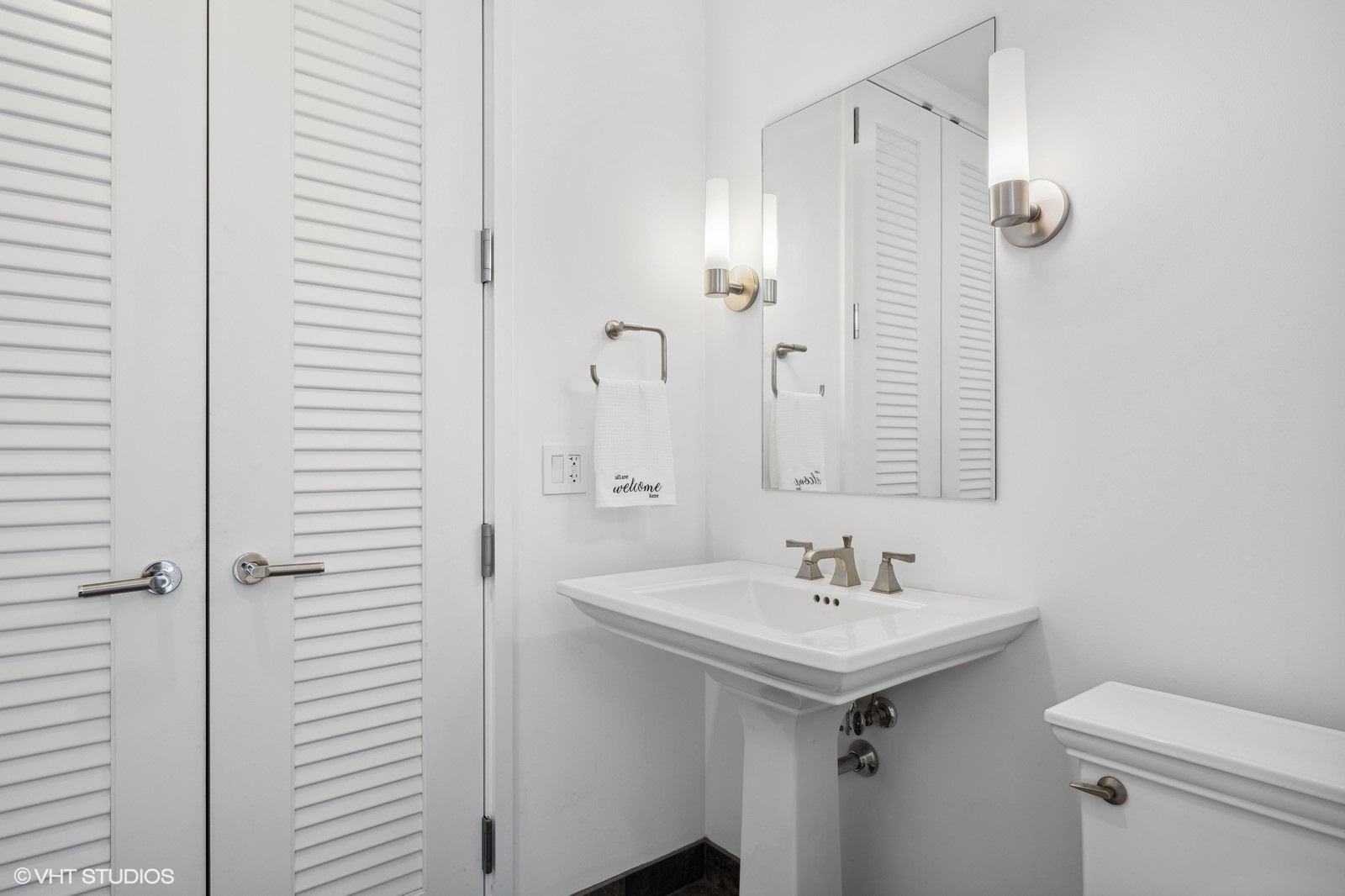 401 North Wabash Avenue, Unit 76E Chicago, IL 60611 - Photo 10 of 37 a bathroom with a sink toilet and shower
