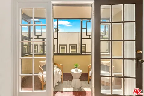 a kitchen with stainless steel appliances a stove a sink and a refrigerator