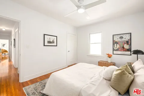 a en suite bathroom with a sink a mirror and a bathtub
