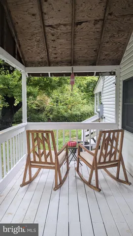 a view of chairs with wooden floor