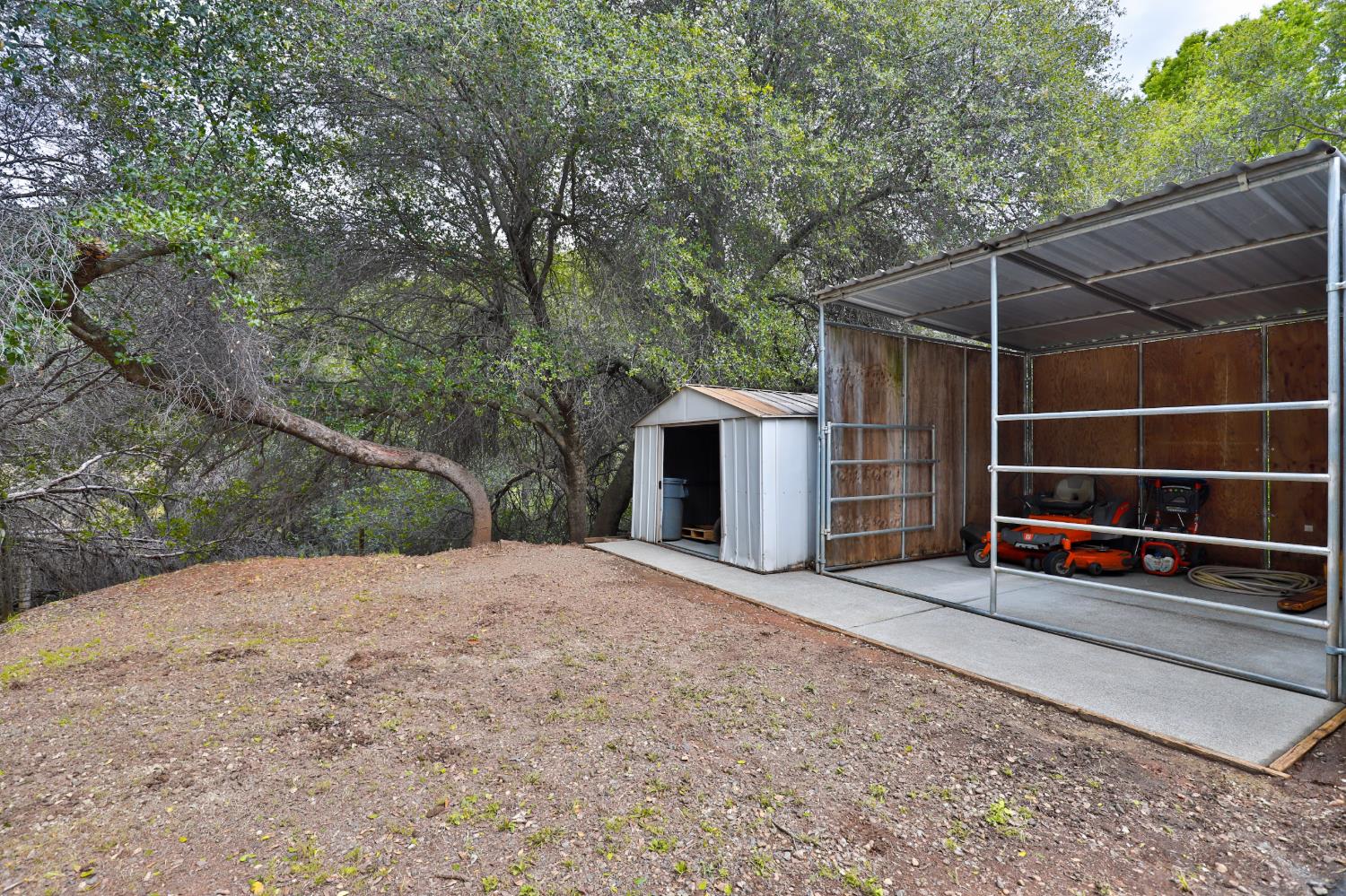 4773 Jacarah Road Placerville, CA 95667 - Photo 83 of 94 There are several storage shed behind the barn.