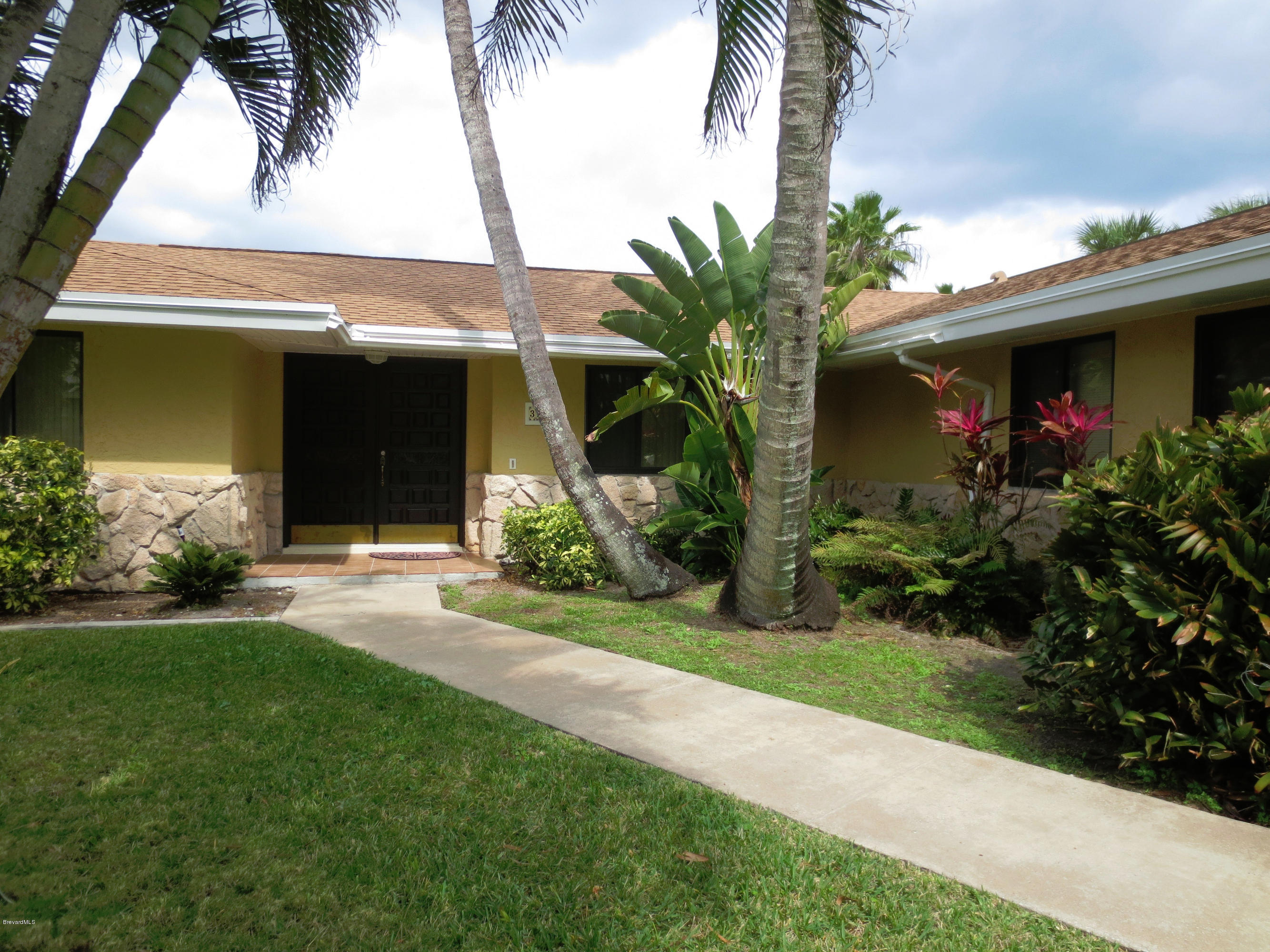 320 Riggs Avenue Melbourne Beach, FL 32951 - Photo 1 of 24 Front Entrance