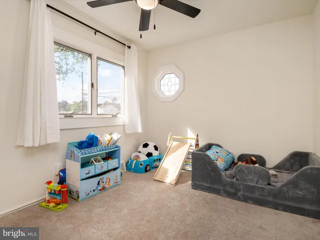 a room with toys and a window