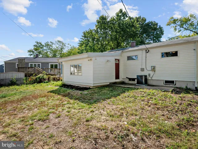a view of a backyard of the house