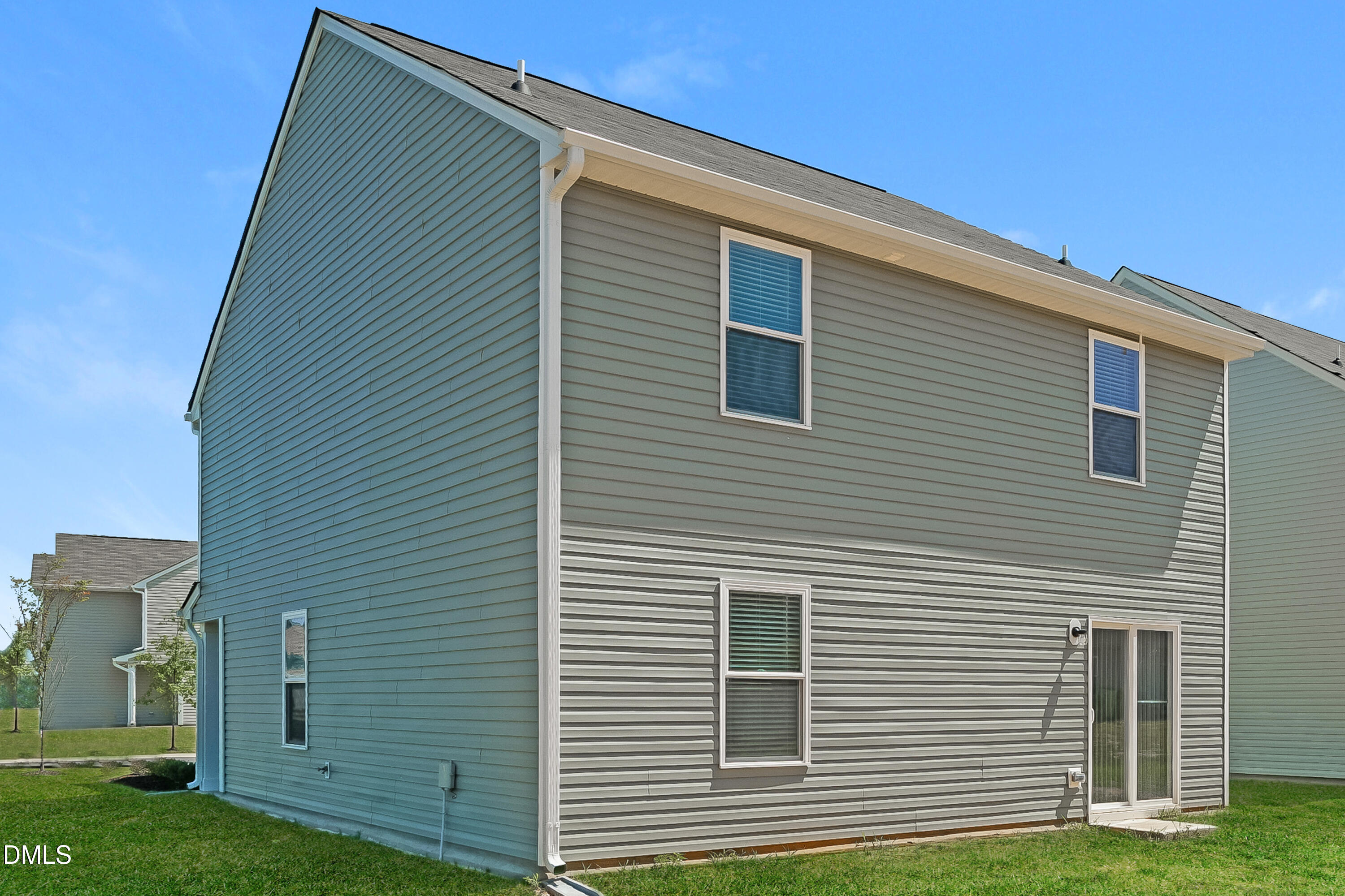 300 Gourd Street Zebulon, NC 27597 - Photo 14 of 17 a front view of a house with a yard