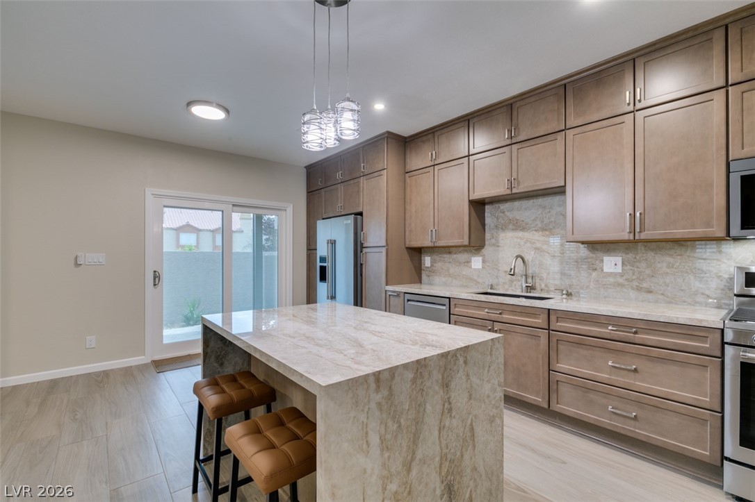 540 Sutters Mill Road Henderson, NV 89014 - Photo 29 of 46 This bright kitchen features sleek appliances and ample counter space for culinary endeavors.