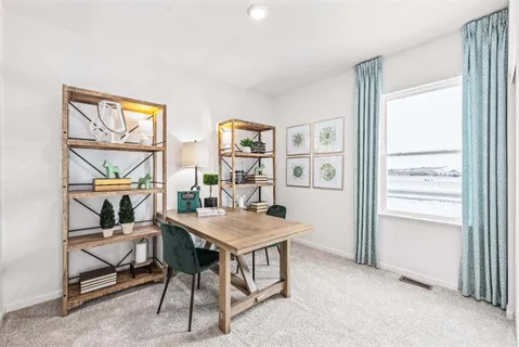 a room with a table and a window