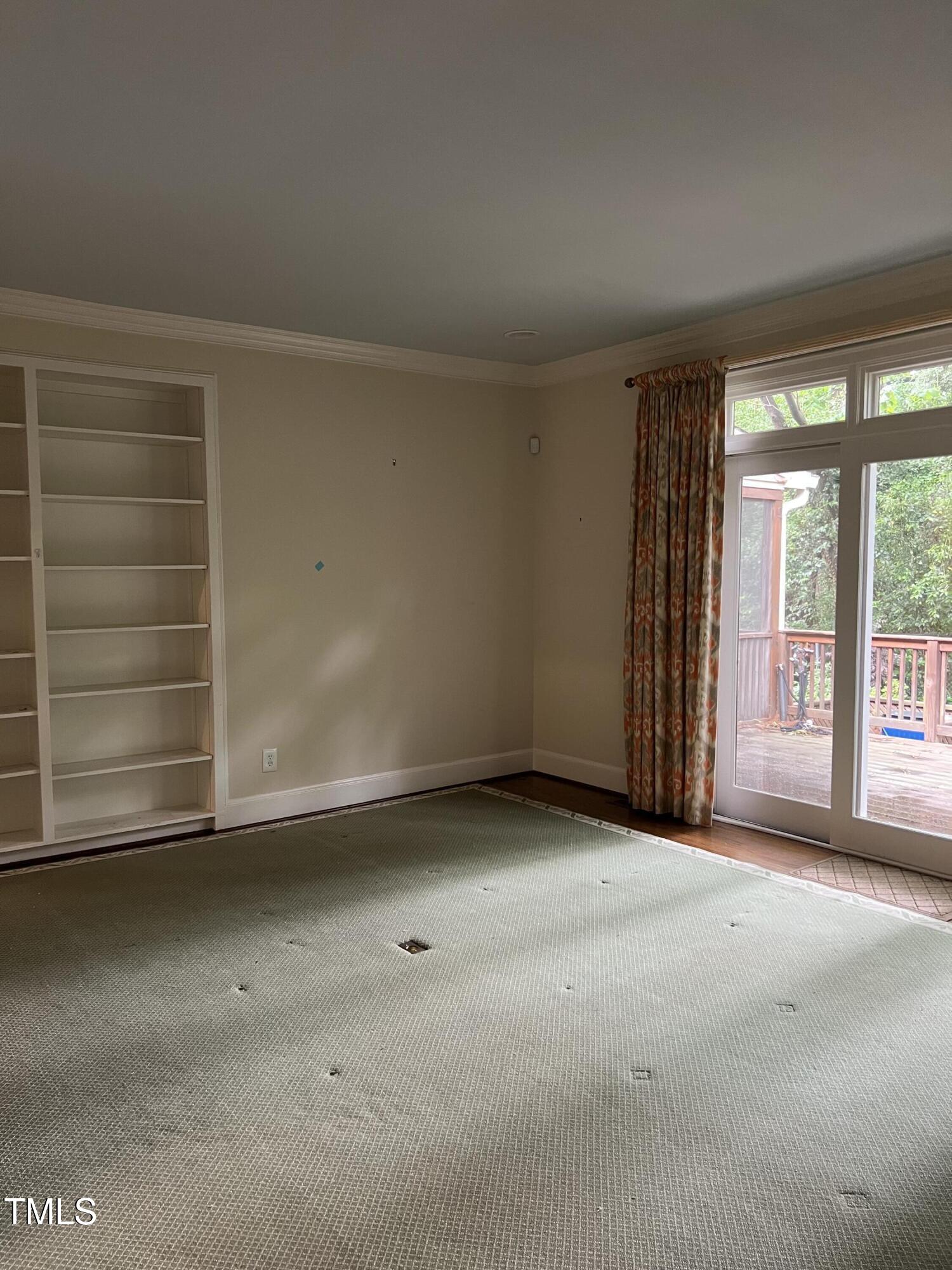 3349 Ridgecrest Court Raleigh, NC 27607 - Photo 8 of 19 an empty room with a empty space and window