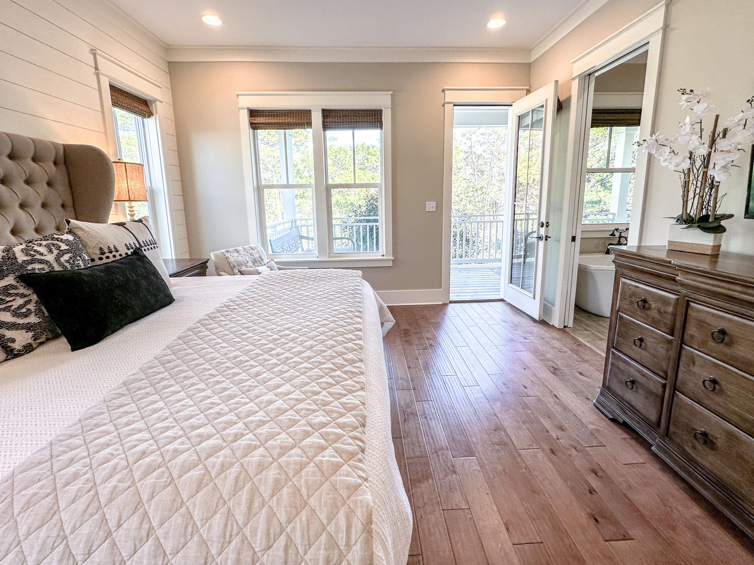 239 Matt's Way Santa Rosa Beach, FL 32459 - Photo 20 of 44 a large bed sitting in a bedroom next to a window with dresser