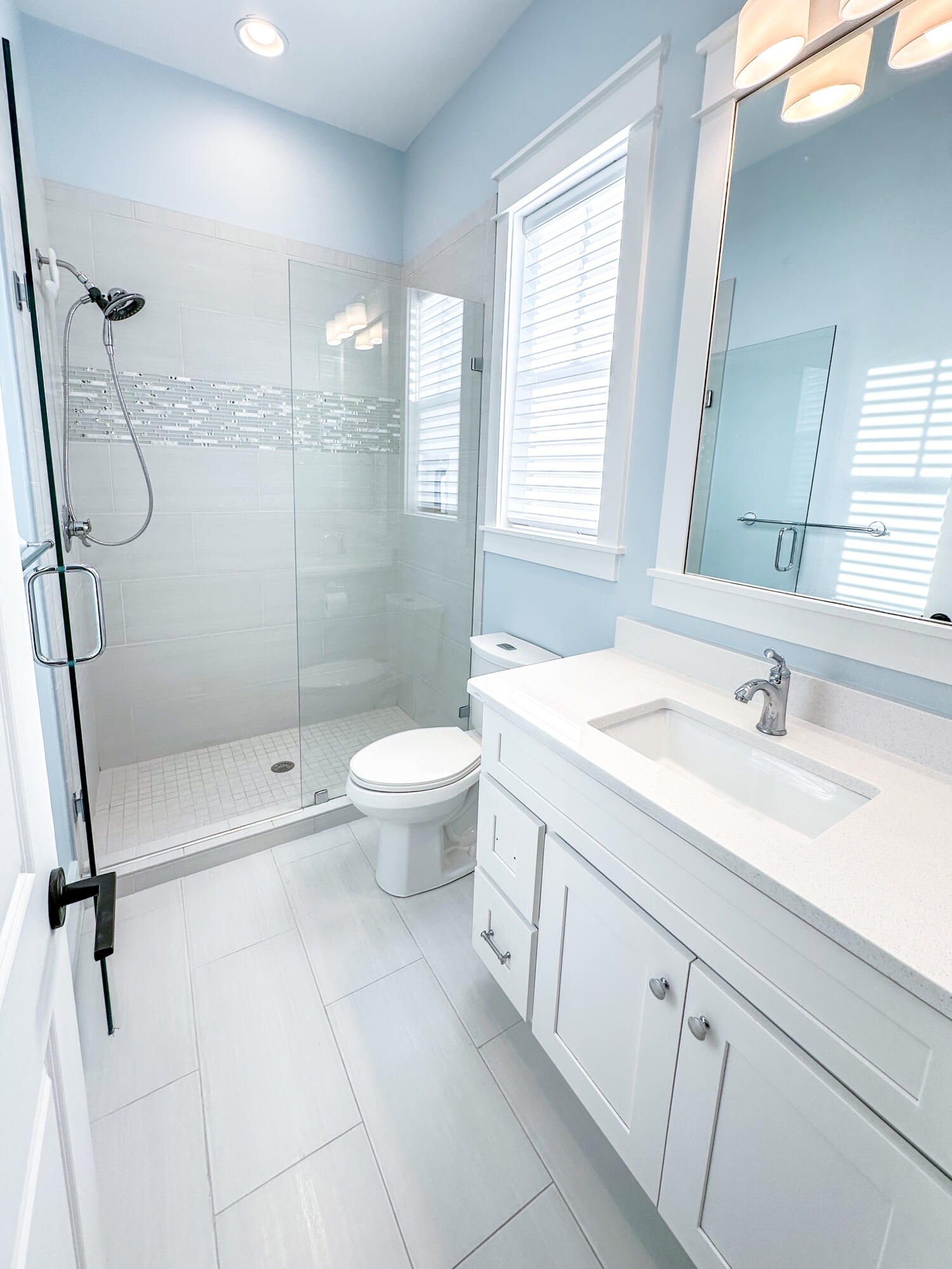 239 Matt's Way Santa Rosa Beach, FL 32459 - Photo 25 of 44 a bathroom with a granite countertop sink a toilet and shower