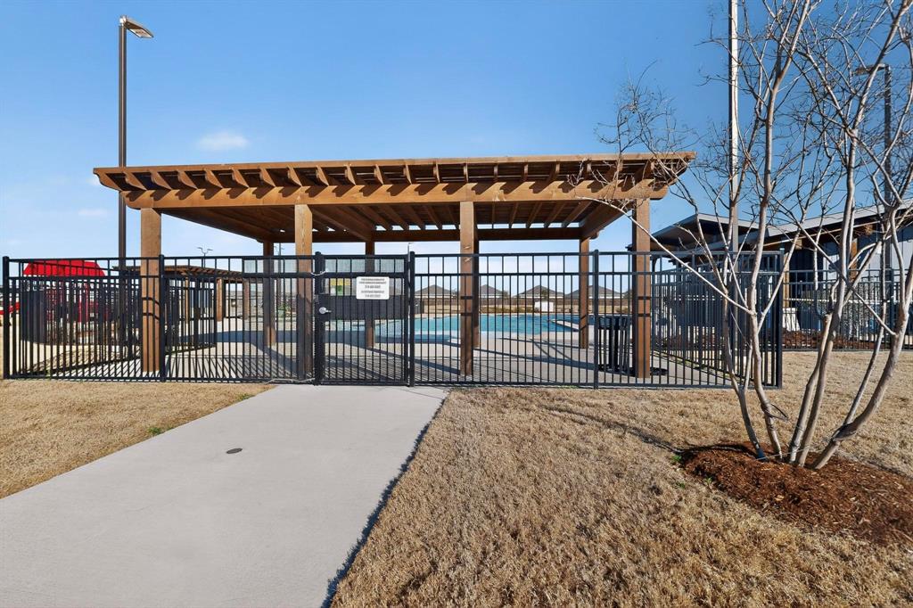 6734 Highlands Street Princeton, TX 75407 - Photo 29 of 40 Surrounding community with a patio and a swimming pool