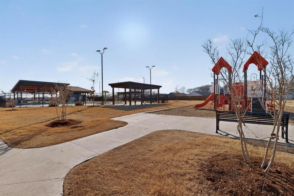 6734 Highlands Street Princeton, TX 75407 - Photo 33 of 40 a view of a park with swings