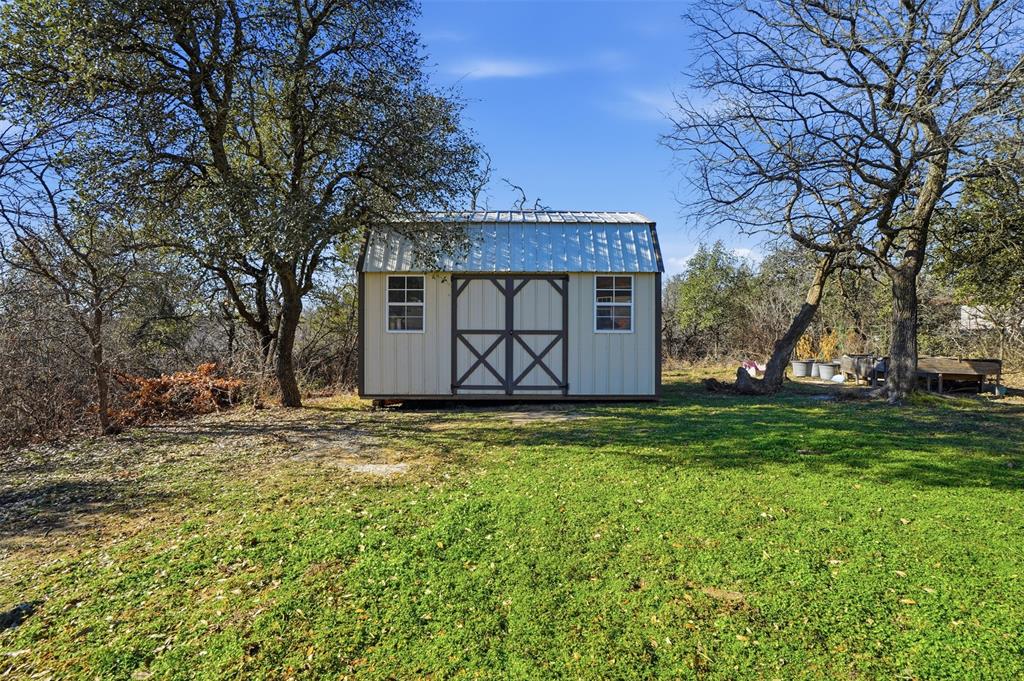 224 Cactus Ridge Court Springtown, TX 76082 - Photo 30 of 39 View of shed