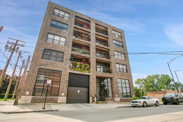 a view of a building and a street