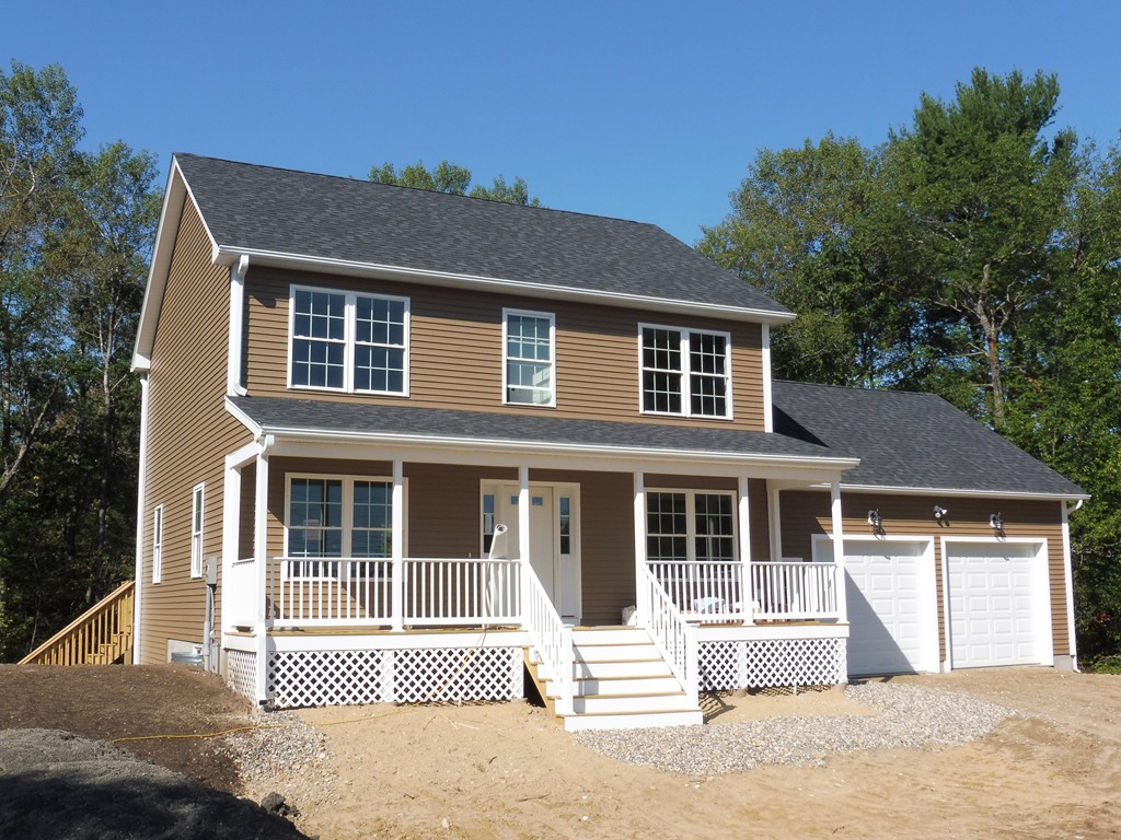 9 Depot Road Ashburnham, MA 01430 - Photo 1 of 16 a front view of a house with a yard
