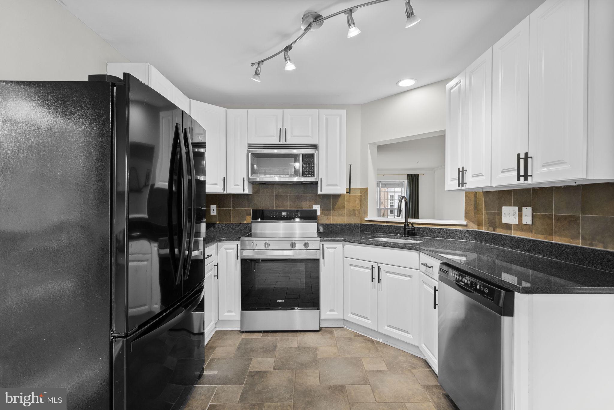 758 Howards Loop Annapolis, MD 21401 - Photo 12 of 64 Kitchen With Pass Thru To Dining/Living Area