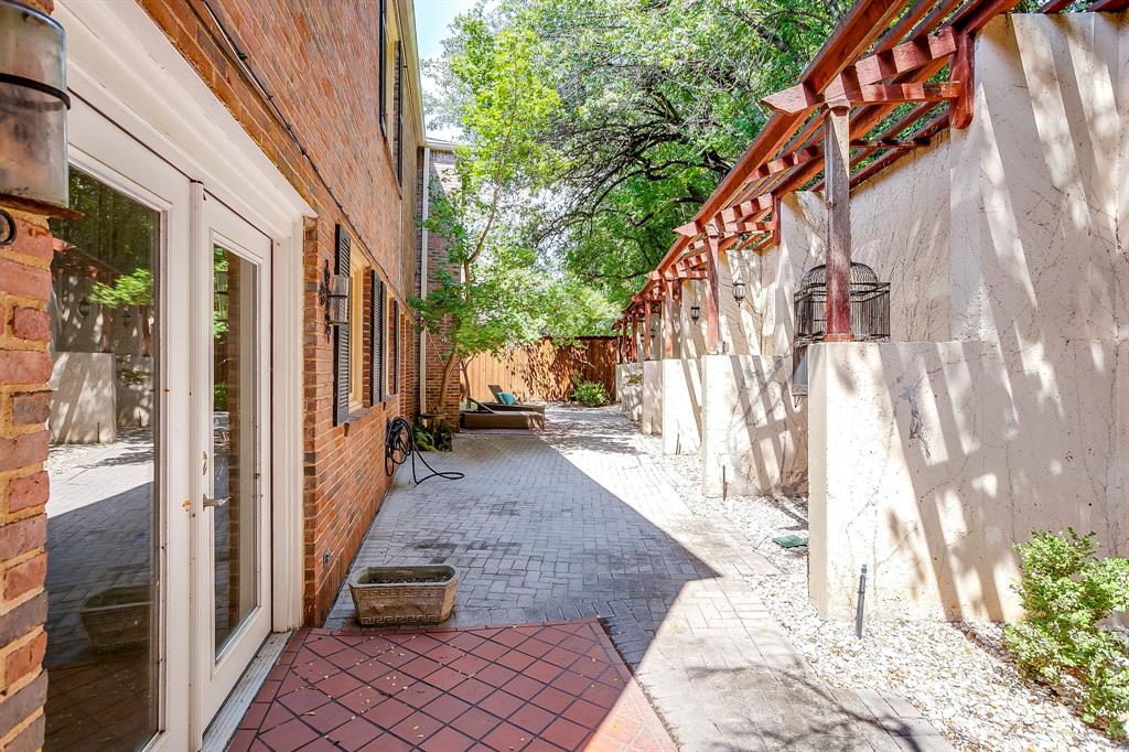 1805 Burton Hill Road Fort Worth, TX 76107 - Photo 39 of 39 a view of a house with a yard