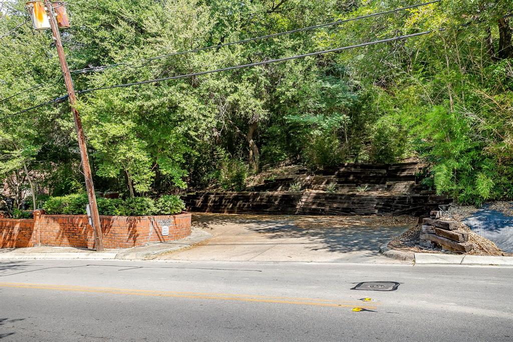 1805 Burton Hill Road Fort Worth, TX 76107 - Photo 5 of 39 a view of a swimming pool with a bench