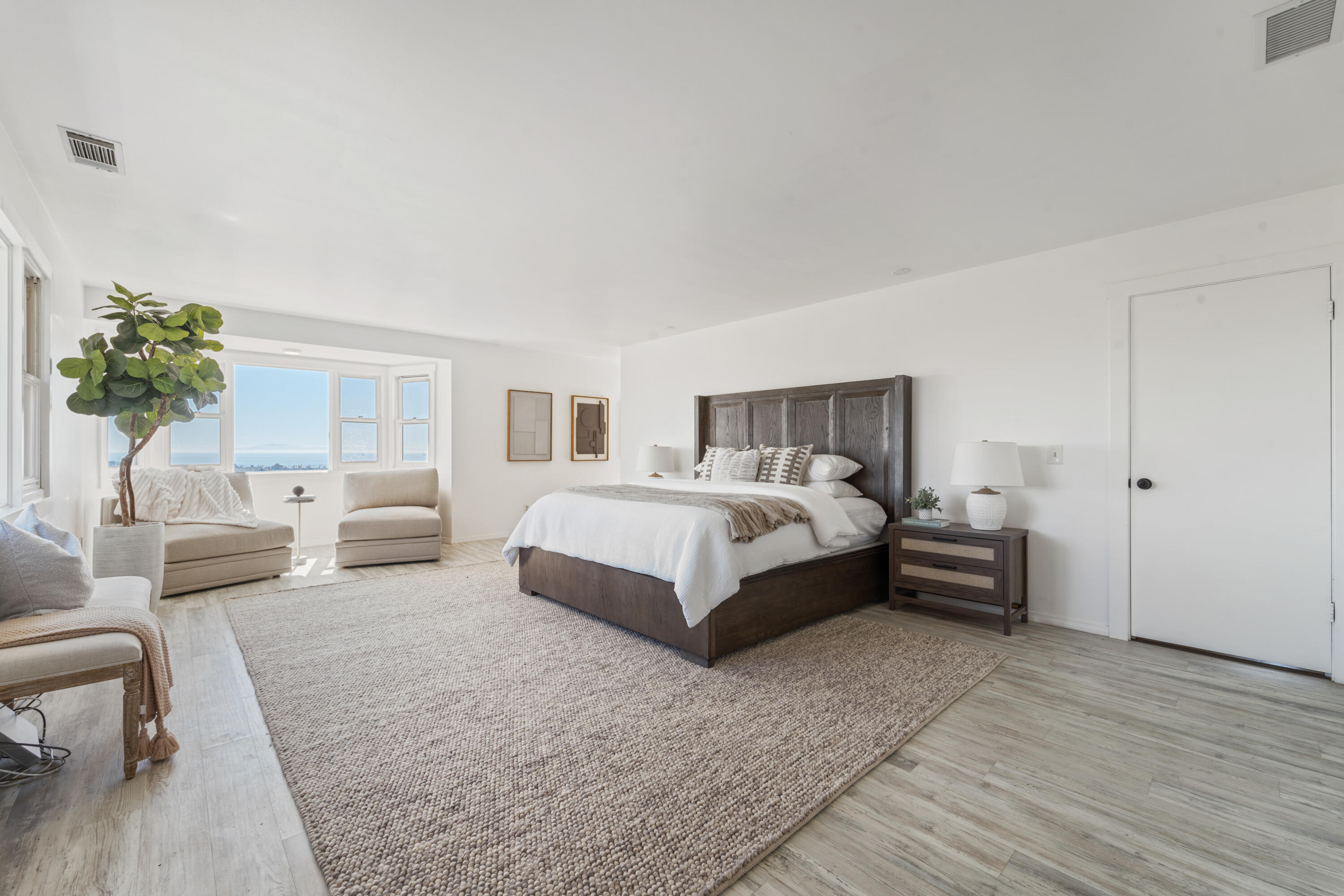 4508 Foothill Road Carpinteria, CA 93013 - Photo 17 of 31 a bedroom with bed couch and window