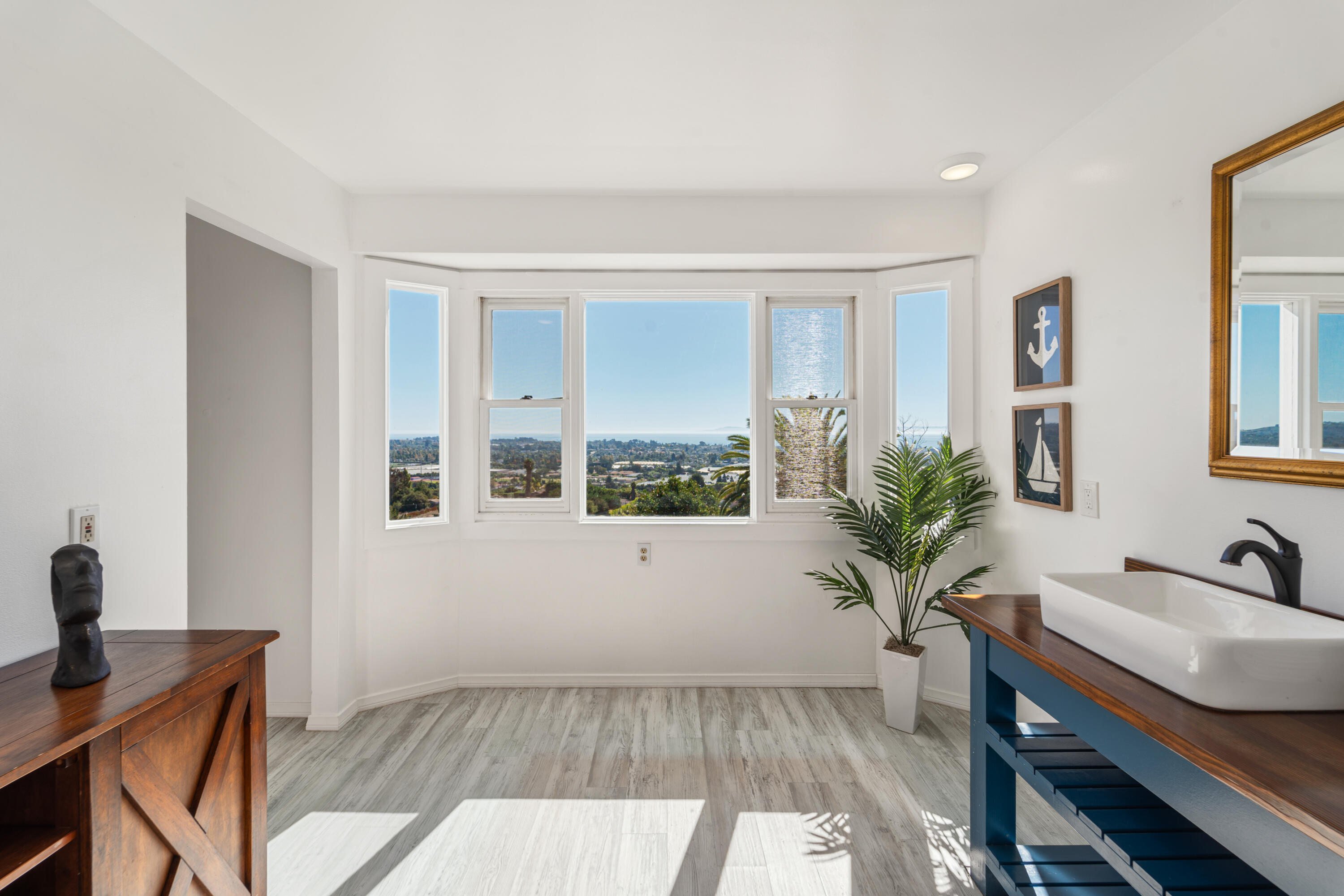 4508 Foothill Road Carpinteria, CA 93013 - Photo 20 of 31 a living room with furniture and a window