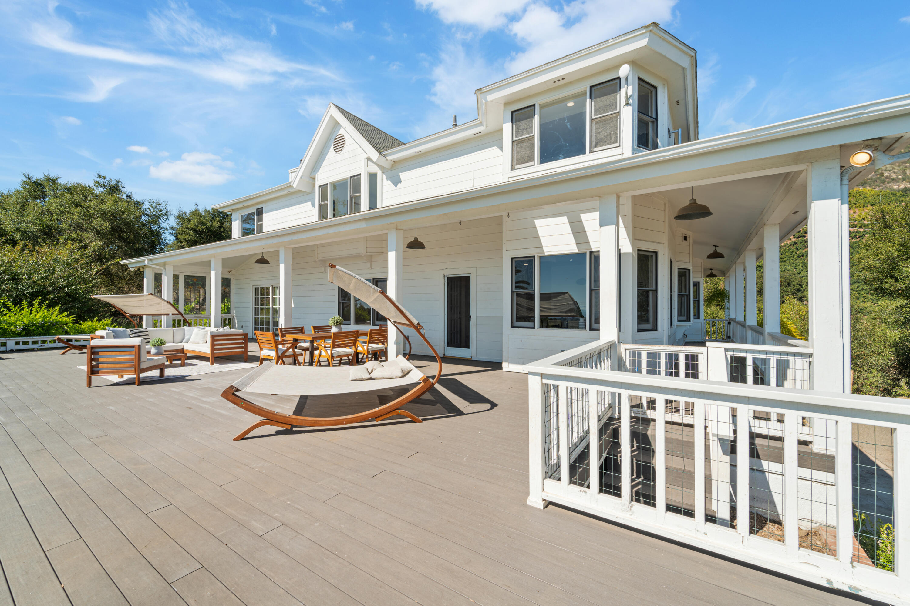 4508 Foothill Road Carpinteria, CA 93013 - Photo 2 of 31 a view of a building with sitting area and garden