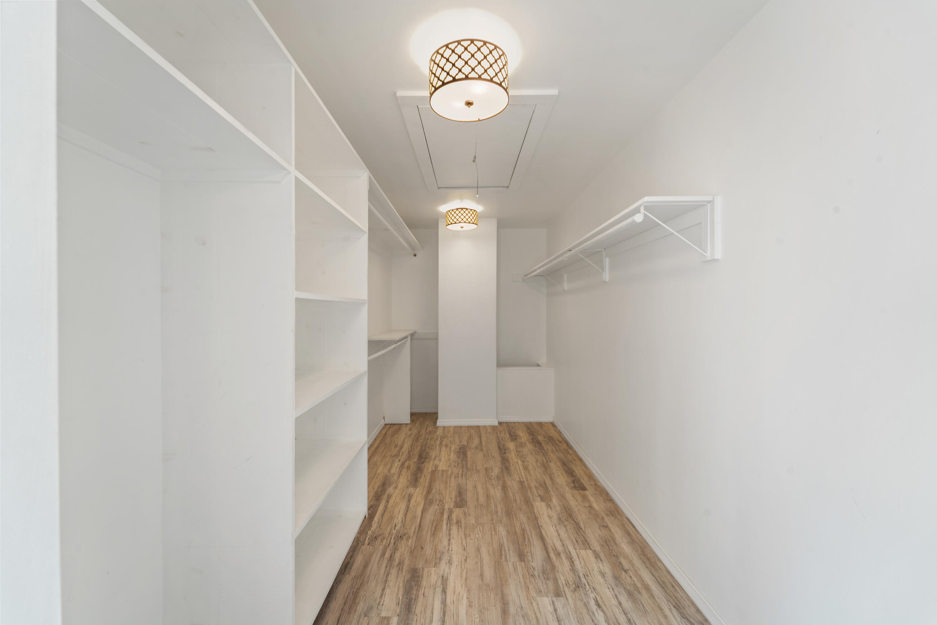 4508 Foothill Road Carpinteria, CA 93013 - Photo 21 of 31 a view of a hallway with wooden floor