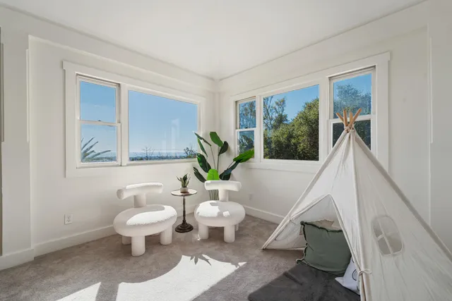 a bathroom with a sink a mirror and a toilet