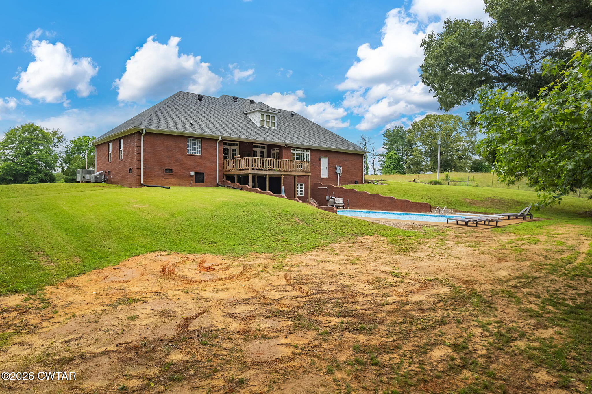4320 Timberlake-Wildersville Road Lexington, TN 38351 - Photo 53 of 58 a view of a house next to a big yard with plants and large trees