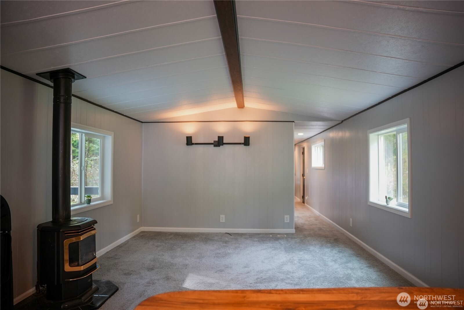 4672 Birch Bay Lynden Road, Unit 61 Birch Bay, WA 98230 - Photo 3 of 11 a view of a livingroom with furniture and a window