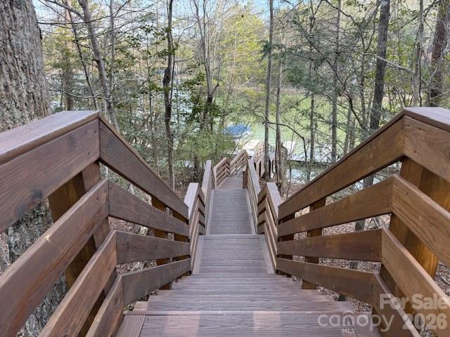 7 Settlement Ridge Drive Marion, NC 28752 - Photo 13 of 24 a view of wooden house with a tree