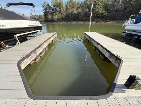 a view of a swimming pool with a lake