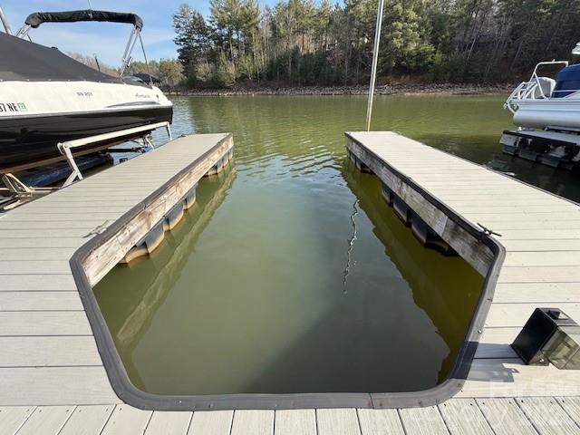 7 Settlement Ridge Drive Marion, NC 28752 - Photo 14 of 24 a view of a swimming pool with a lake