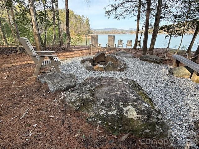 7 Settlement Ridge Drive Marion, NC 28752 - Photo 20 of 24 a view of a house with backyard and sitting area